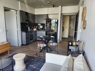 Open concept living and dining area with direct balcony access PH Centriqo Panama Pacifico