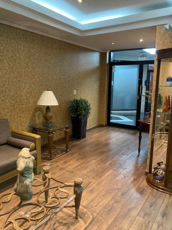 Lobby with sofa, armchairs, glass tables artistic decor PH Plaza Obarrio Panama City