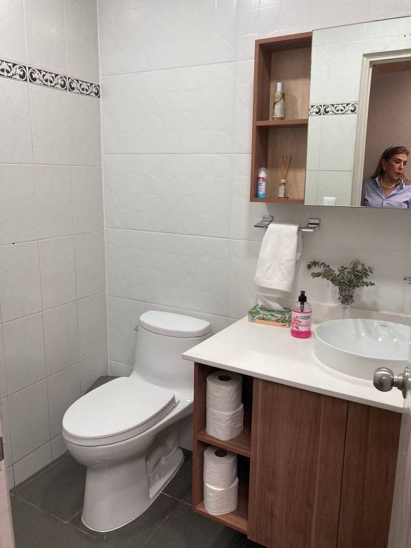 Bathroom with white tiles, vessel sink, mirror cabinet, modern decor in PH Plaza Obarrio Panama City