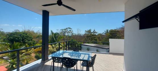 Modern industrial open-plan living with mezzanine, high ceilings, large windows Copecito Panama