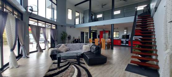 Bright master bedroom with terrace access and garden views in San Carlos Panama