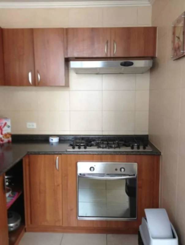 Bedroom with large built-in wardrobe, ceiling fan, tile floor in PH Marbella 47 Panama City