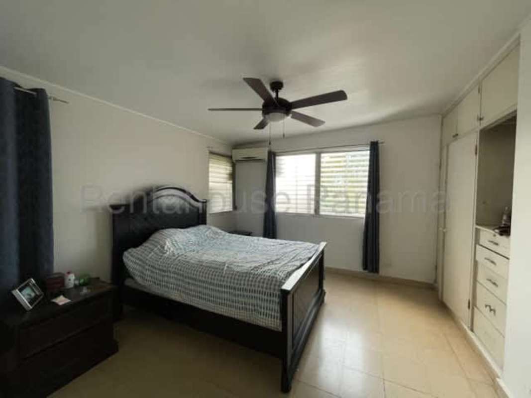 Large bedroom with windows in Betania residential house for sale Panama