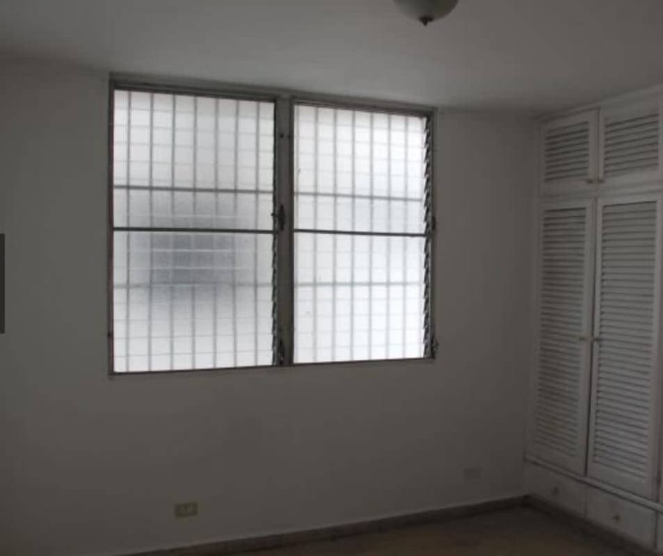 Minimalist second bedroom with built-in closet PH El Carmen Panama