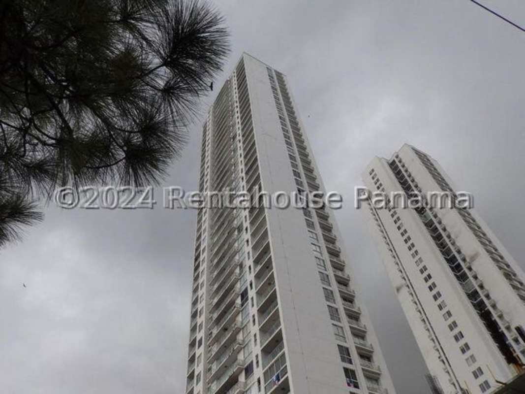 Bedroom with large windows and ocean view at PH Bahia del Golf Coco del Mar Panama