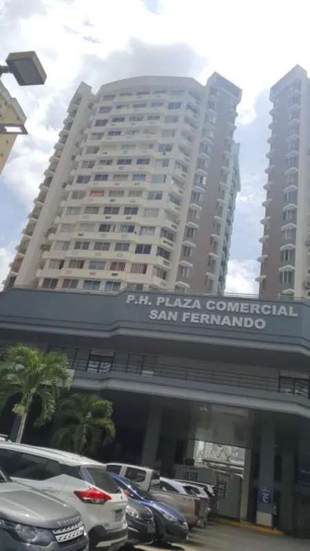 Spacious living room with balcony, city views at PH San Fernando Via España Panama