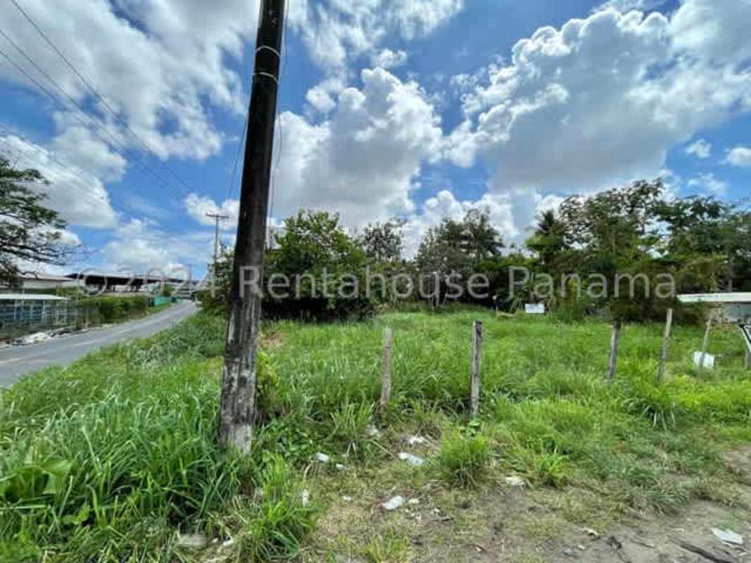 Cleared grassy plot ready for development with road and power lines Parque Lefevre Panama