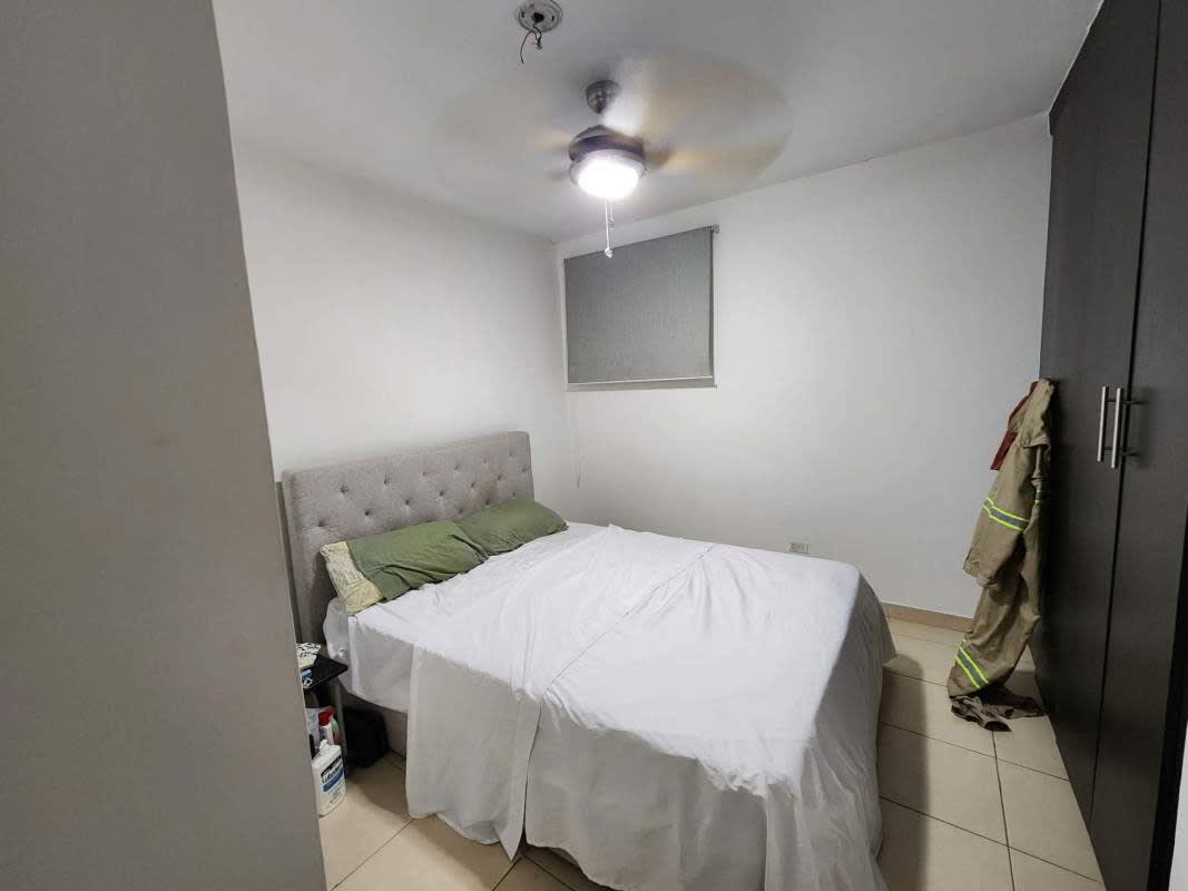 Entrance hall with security door and metal gate inside PH Lefevre Park Panama