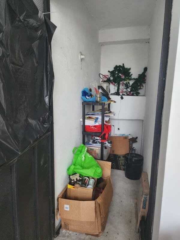 Compact bathroom with granite countertop, toilet, and shower in PH Lefevre Park Panama