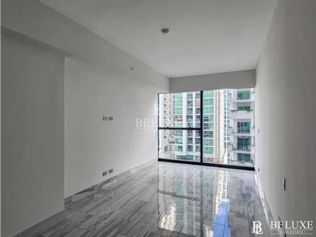 Contemporary kitchen with sleek cabinetry, porcelain tile in Nuovo by Armani Panama City
