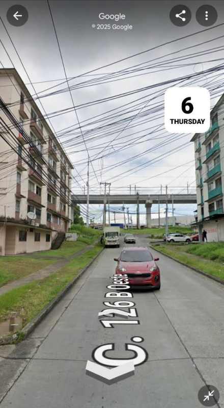 Exterior parking area with multi-story apartment buildings Residencial San Pedro 2 Panama