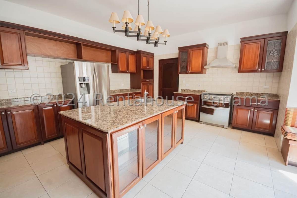 Large master suite with balcony access and natural light in Mediterranean home Ancon Panama