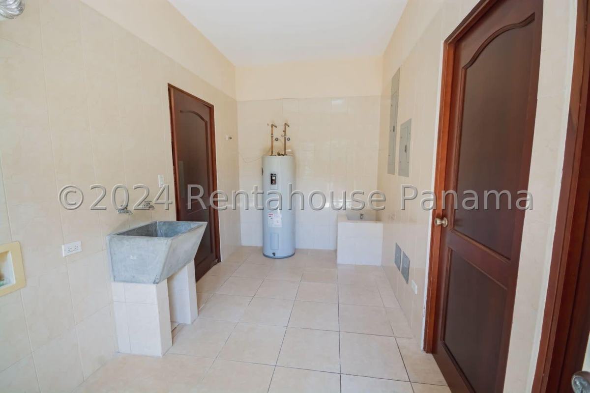 Luxury bathroom with double vanity, walk-in shower and modern tile in Ancon Panama home