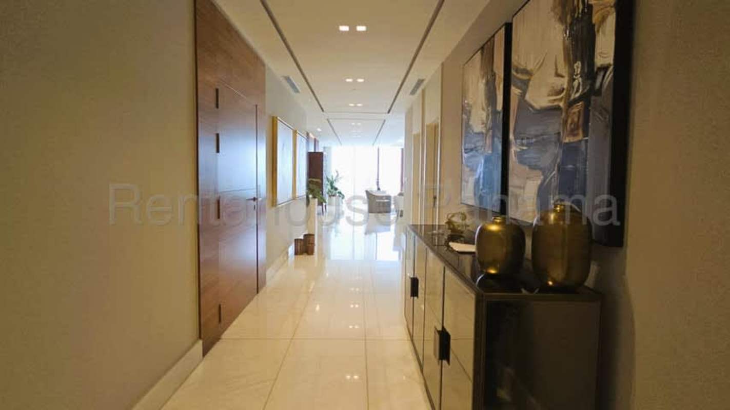 Bright spacious bedroom with access to balcony and Pacific Ocean view in Punta Pacífica Panama