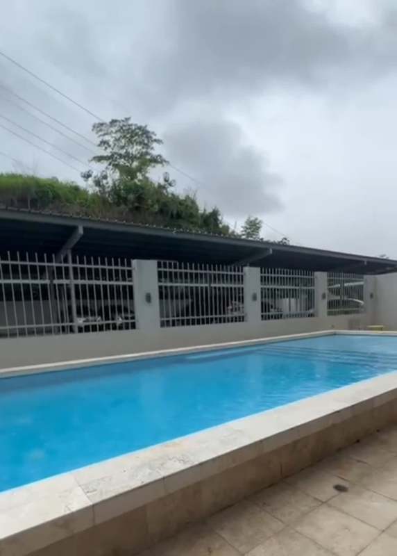 Swimming pool with deck in PH Villa de las Fuentes Panama City