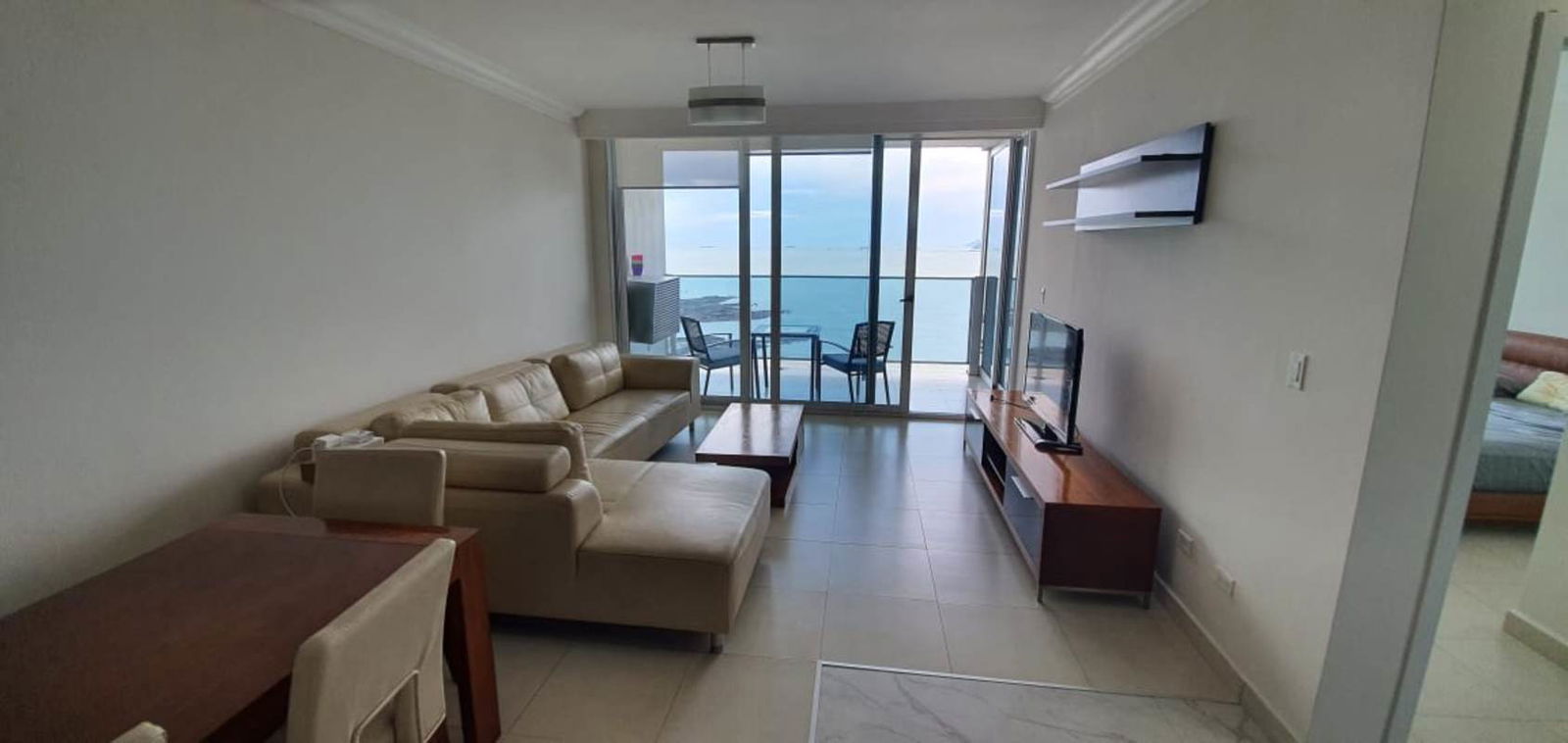 Spacious living room with ocean views in luxury apartment PH Waters on the Bay Panama City