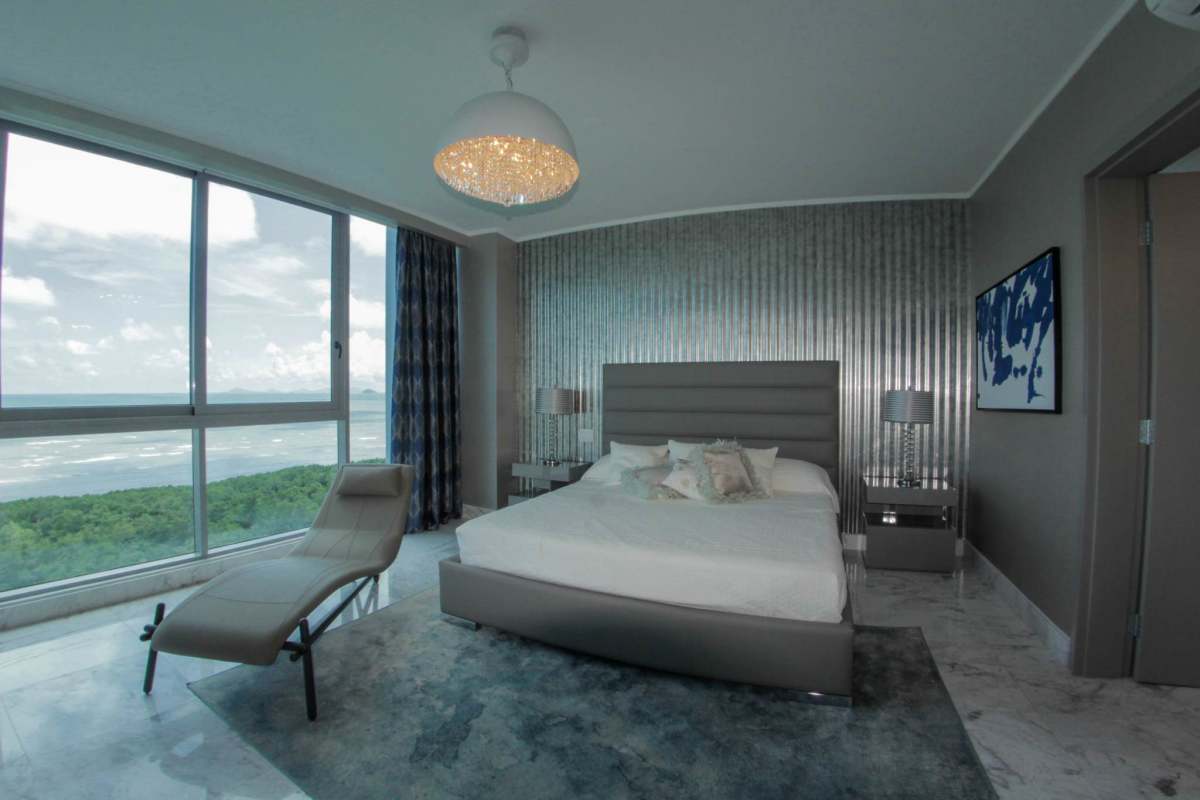 Modern open kitchen with island and dining area PH Ocean House Santa Maria