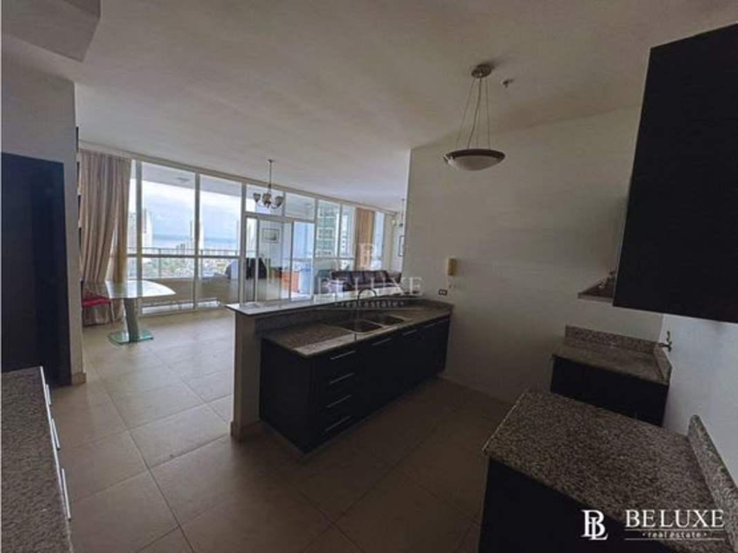 Spacious bedroom with large windows city skyline view PH Quadrat San Francisco Panama