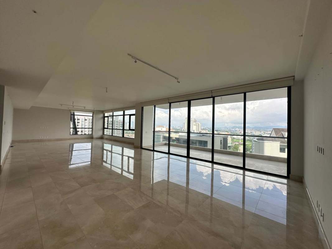 Sleek minimalist kitchen marble floors island large windows PH Albatross Santa Maria Panama City