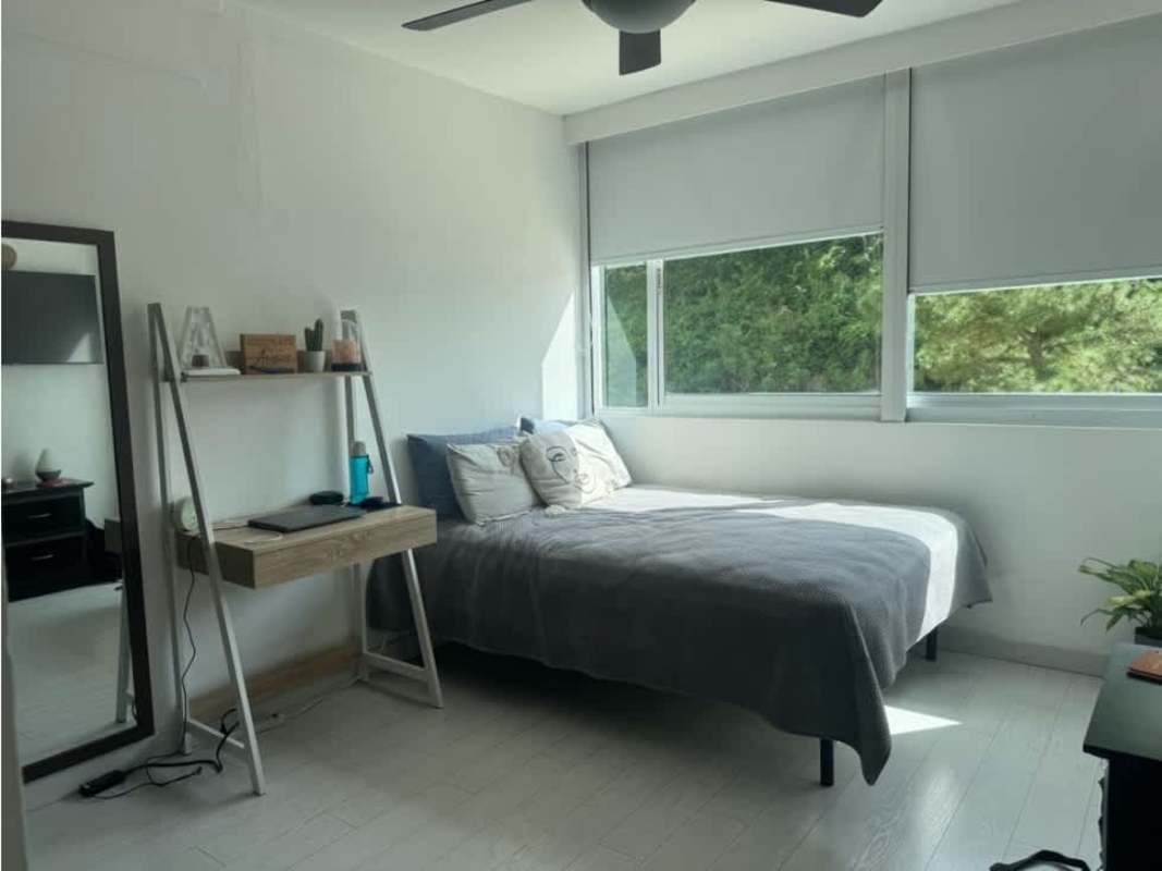 Bedroom with large window balcony view garden setting PH Pine Hills Albrook Clayton apartment for sale