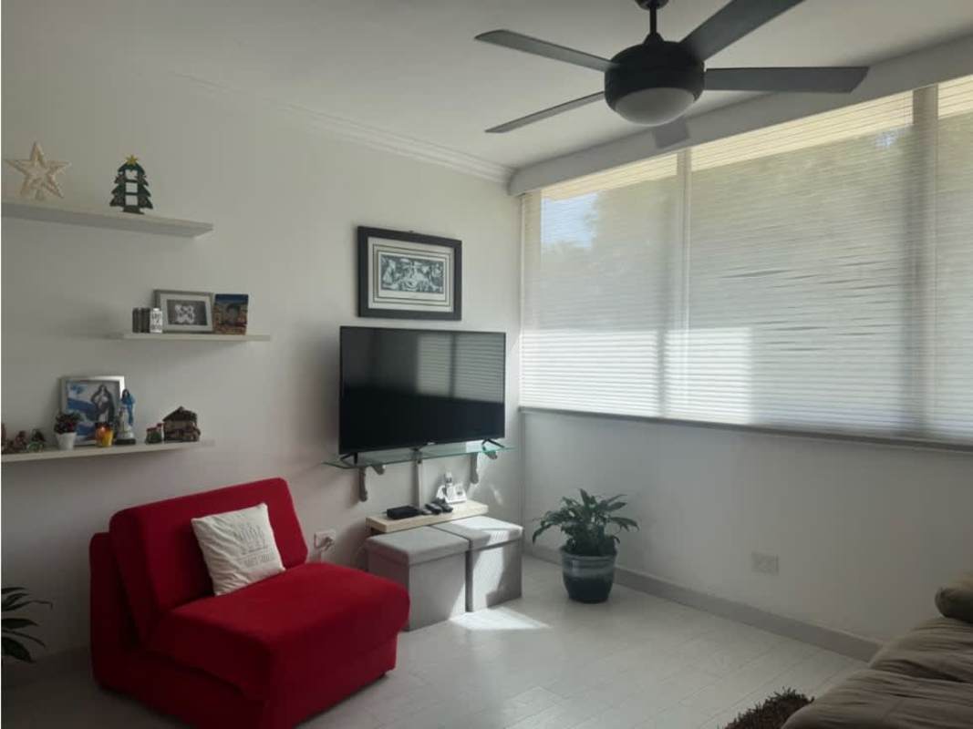 Teen bedroom with guitars wall mounted, window greenery view PH Pine Hills apartment for sale Panama