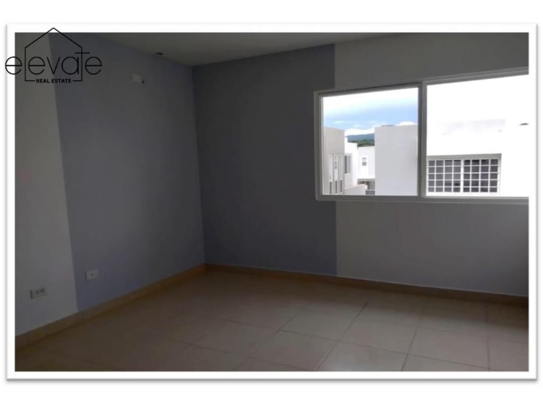 Bright bedroom with large window tiled floor PH Augusta Panama City