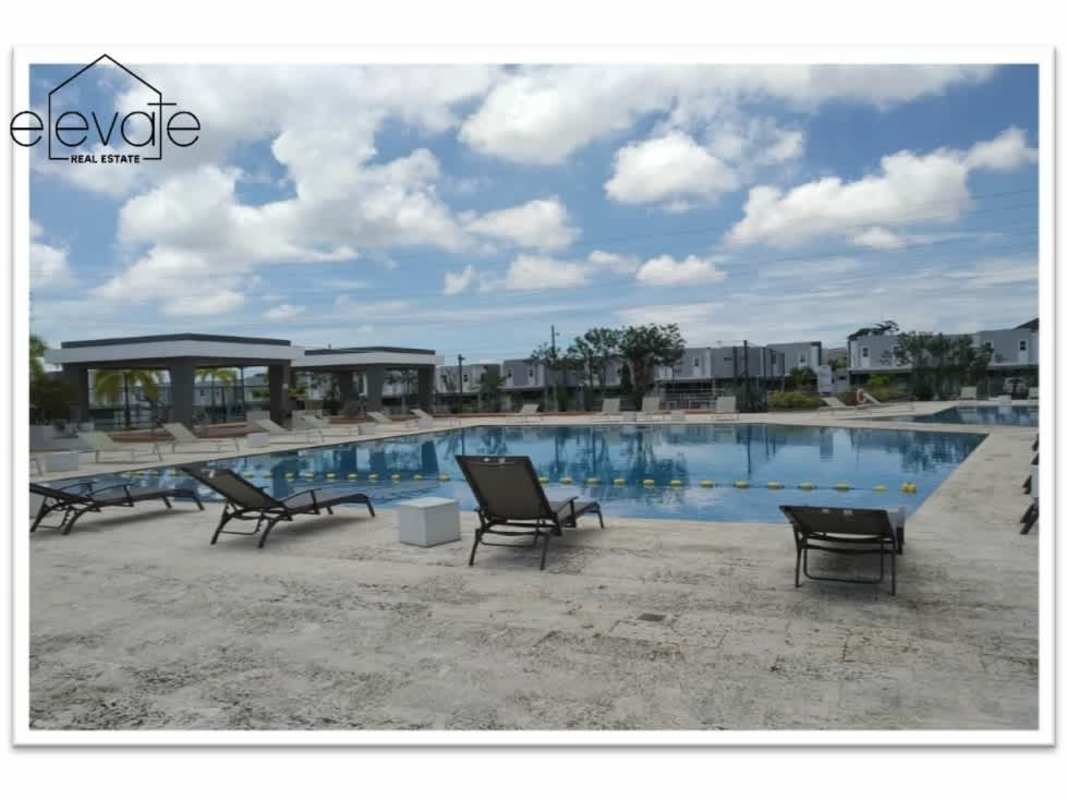 Community pool lounge chairs cabanas green areas PH Augusta