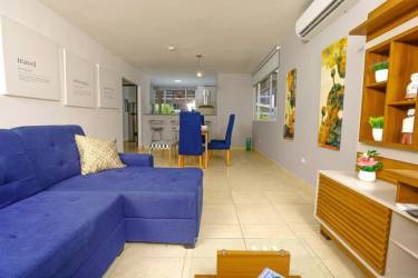 Modern living and dining with natural light in Coronado beach home