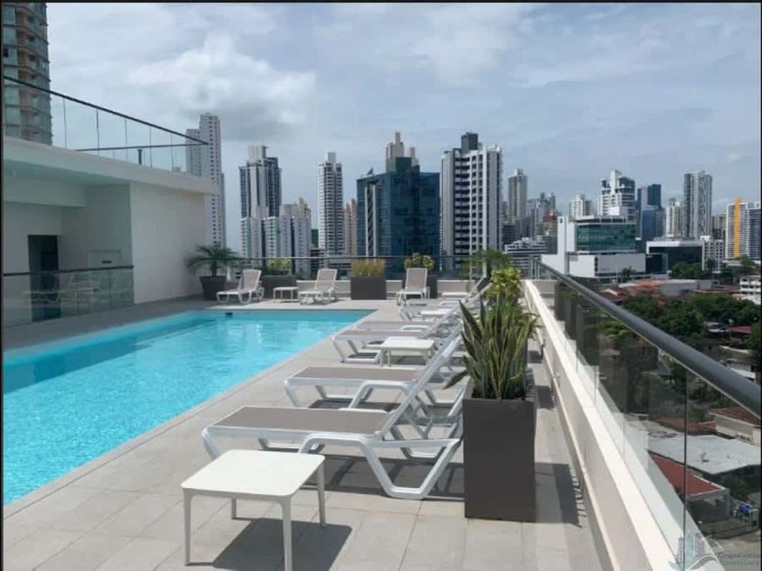 Rooftop sun deck lounge chairs skyline view PH Coco Place Coco del Mar Panama