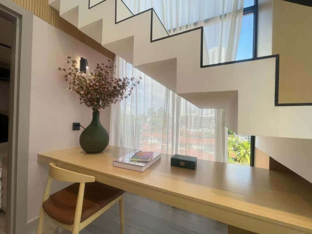 Compact home office workspace with modern stairs in PH Serenity Coco del Mar Panama
