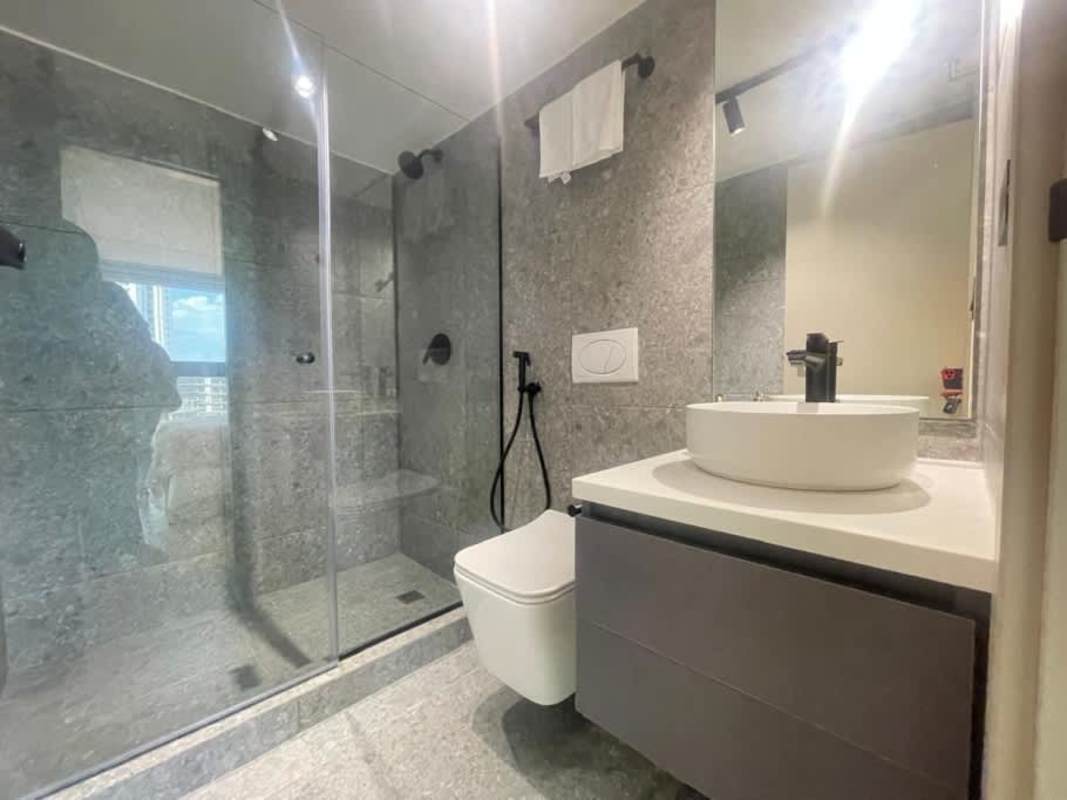 Contemporary bathroom with glass shower stylish finishes at PH Serenity Coco del Mar Panama