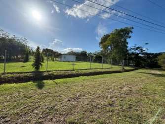 Fenced countryside property with small house, trees and spacious lot at Hacienda La Florenciana