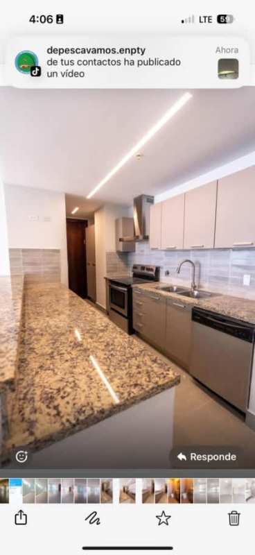 Modern open kitchen granite counters stainless appliances PH Ocean Club Punta Pacifica Panama