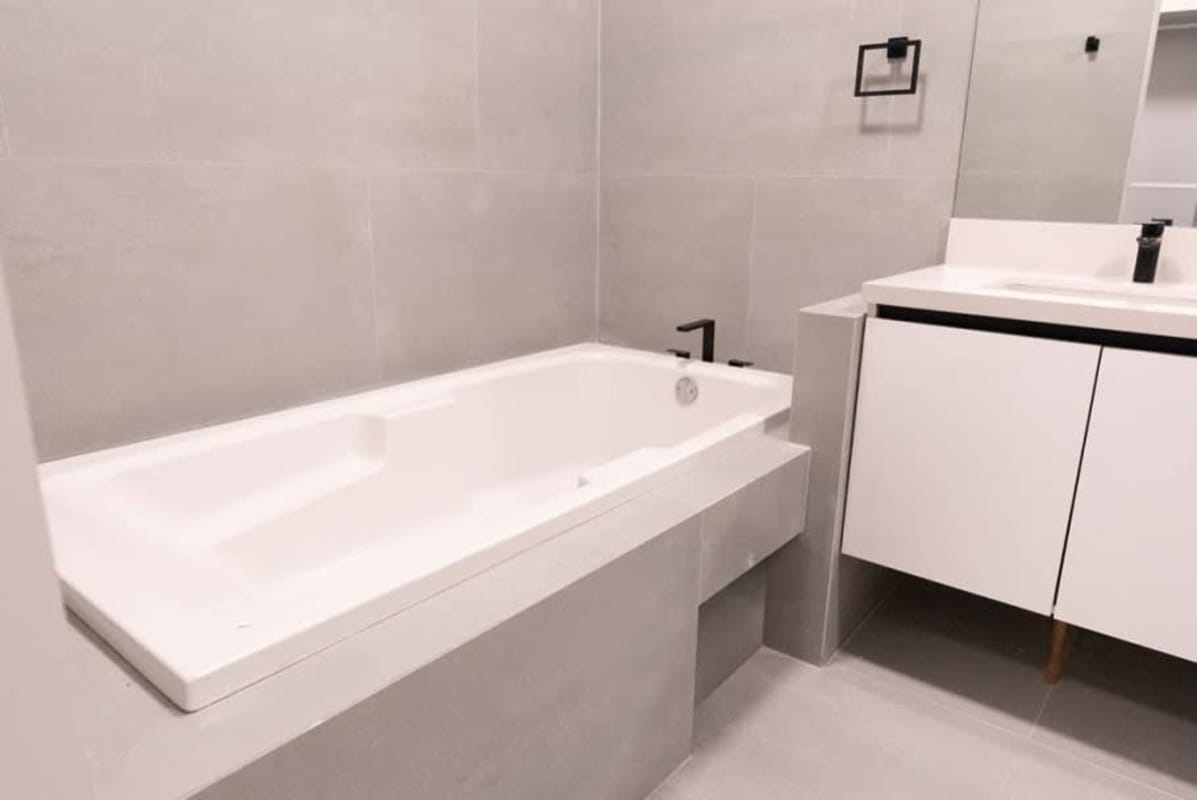 Modern kitchen with granite countertops and stainless appliances in PH Ocean Club Panama