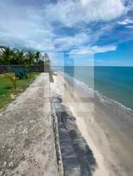 Bedroom with large window ocean view Playa El Palmar beach house Panama