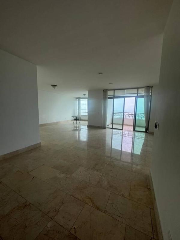 Spacious living room with marble floors and large windows ocean views Punta Pacifica