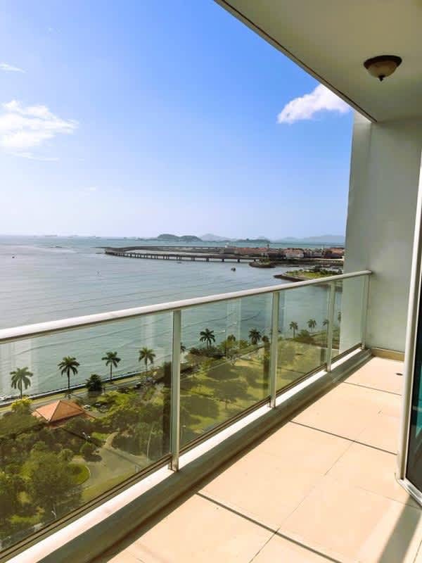 Spacious living room with floor-to-ceiling windows and balcony overlooking Pacific Ocean PH Destiny Panama City