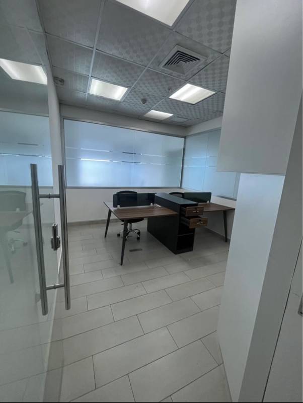 Conference space with table, chairs, window and shelving Oceania Business Plaza Panama