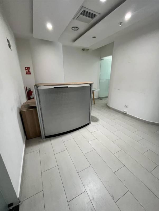 Reception lobby with curved desk and modern lighting in Punta Pacifica Panama