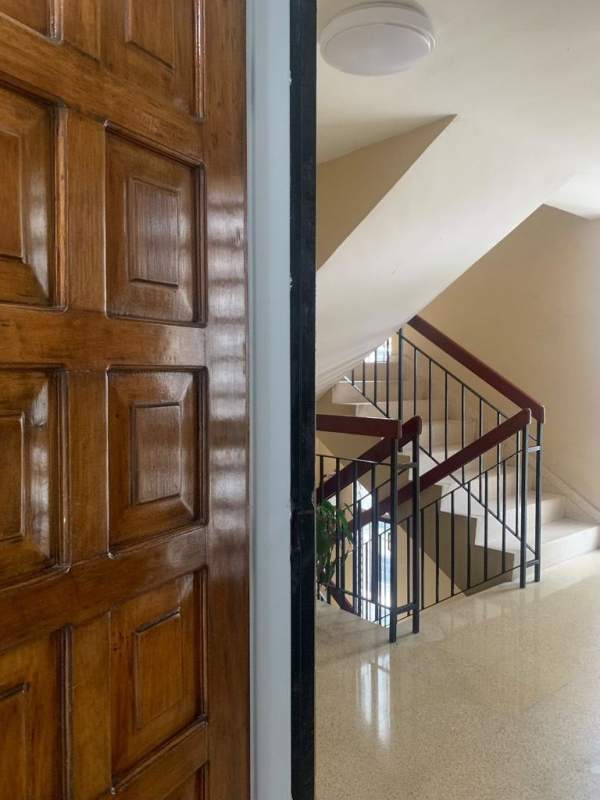 Interior hallway with stairs and door PH La Concha Marbella furnished apartment Panama