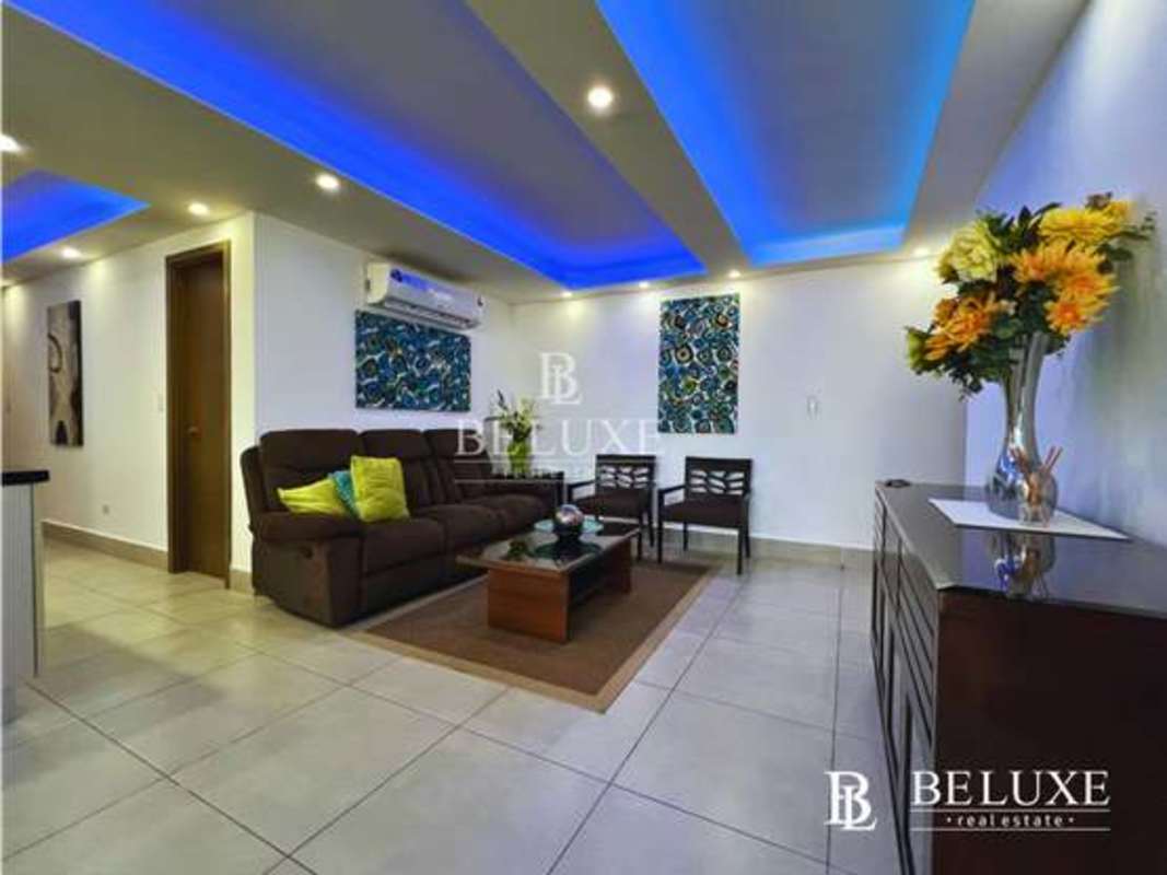 Fully equipped kitchen with granite countertops, tile backsplash and built-in appliances at PH Park City Obarrio Panama