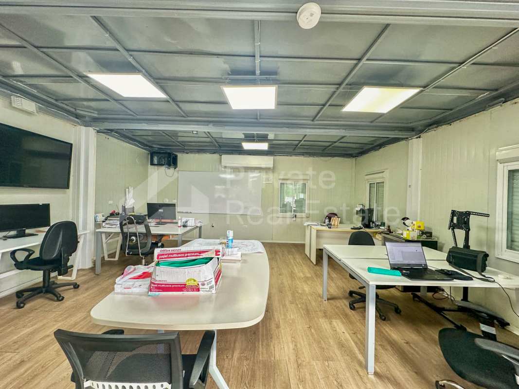 Spacious office workstation inside industrial warehouse Las Mañanitas Panama