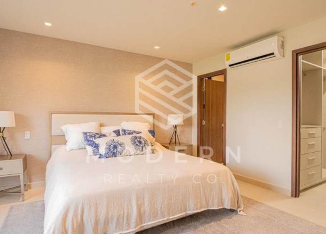 Marble bathroom with glass shower, double vanity in Ocean Reef Residences Panama