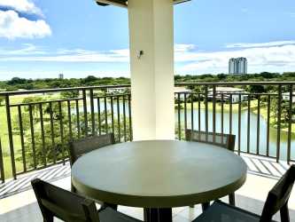 Balcony with furniture showcasing ocean and lagoon at Buenaventura Panama penthouse