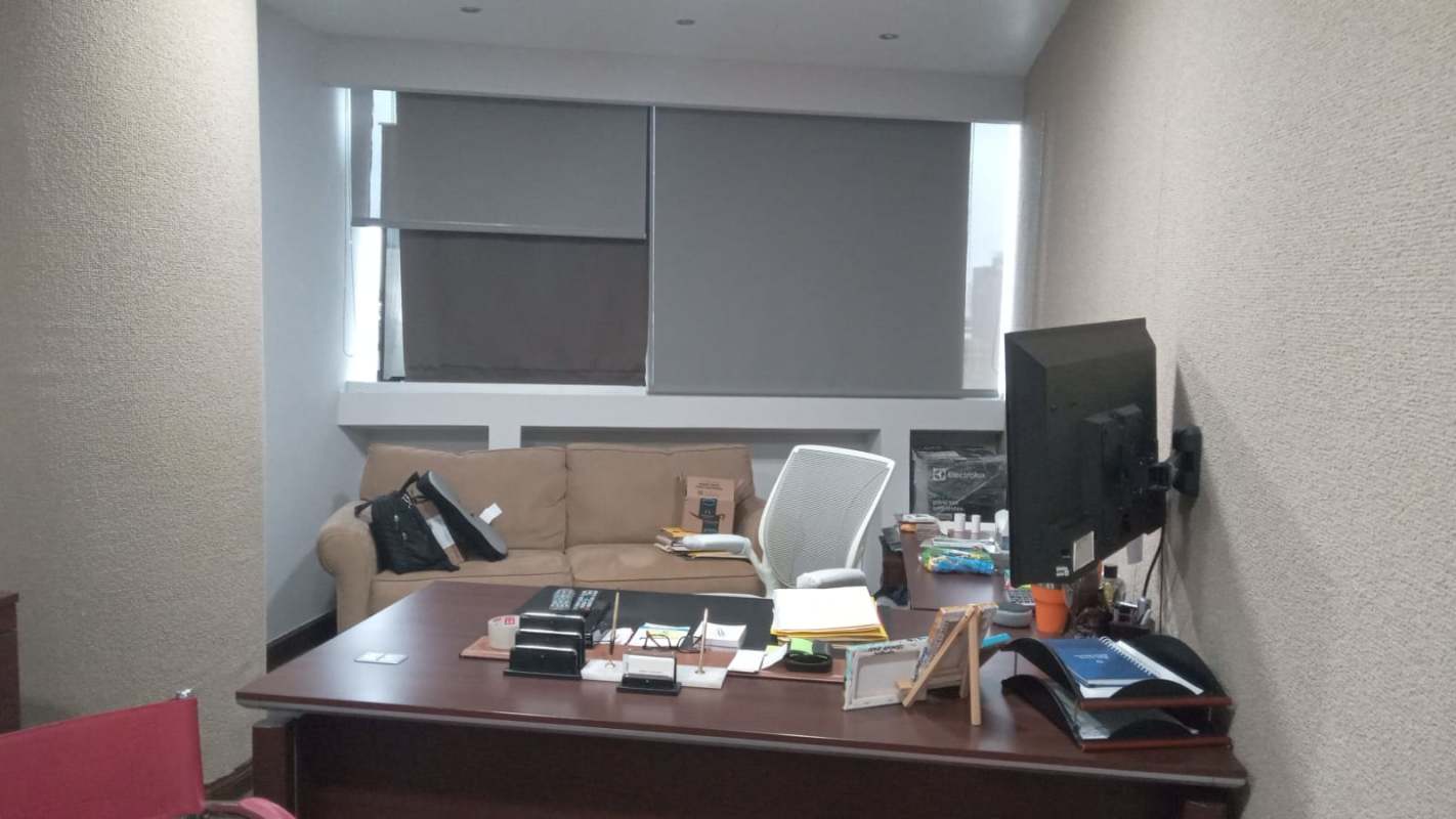 Office lounge with frosted glass partitions sofa minimalist design Plaza Pacific Panama