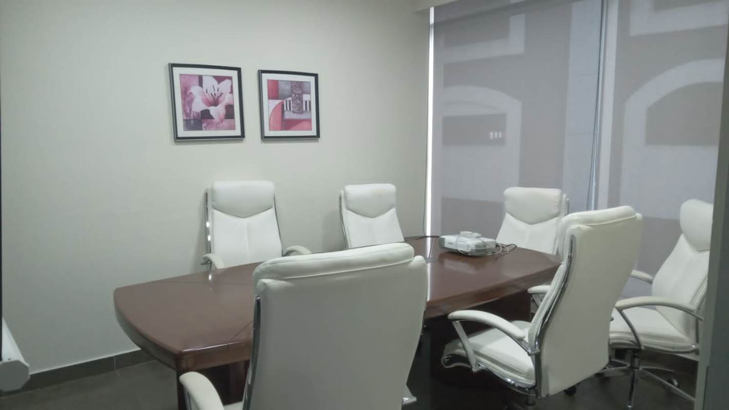 Entry hallway with signage and recessed lighting in Plaza Pacific Panama City