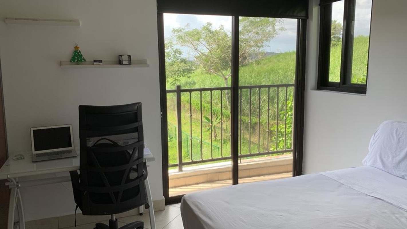 Laundry area with washer dryer in Embassy Club Clayton apartment in Panama