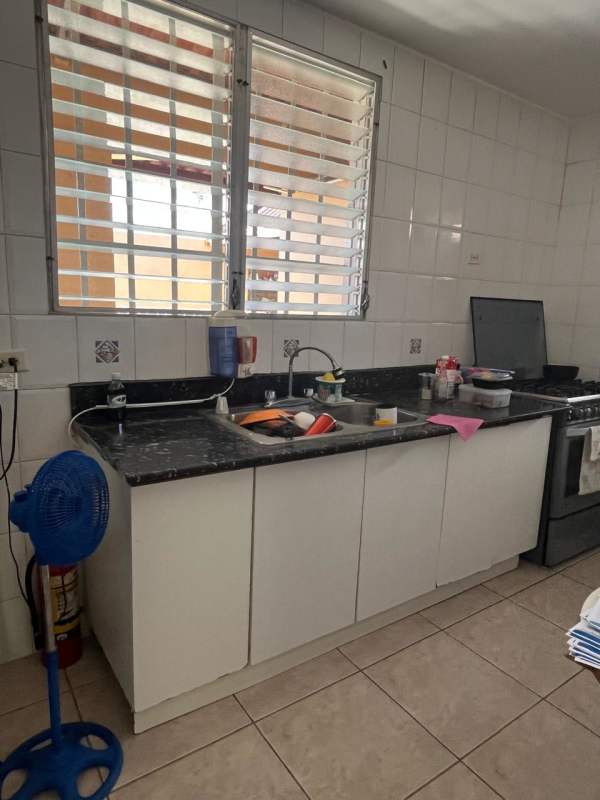 Bedroom featuring ceramic floor, ceiling fan, closet space in Brisas del Golf Panama
