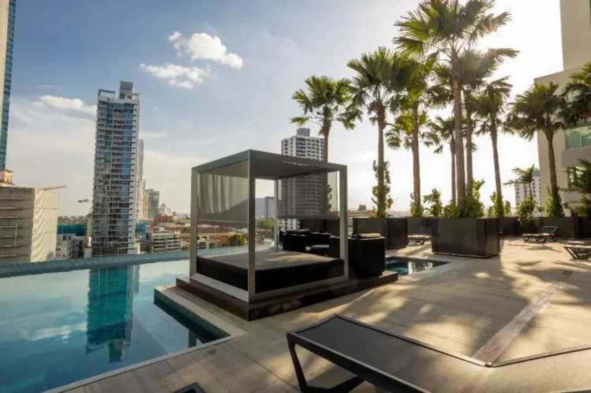 Rooftop infinity pool overlooking Panama skyline and ocean at Nuovo by Armani Casa Avenida Balboa