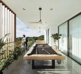 Open plan kitchen with island, white cabinetry and pendant lighting in Panama Pacifico